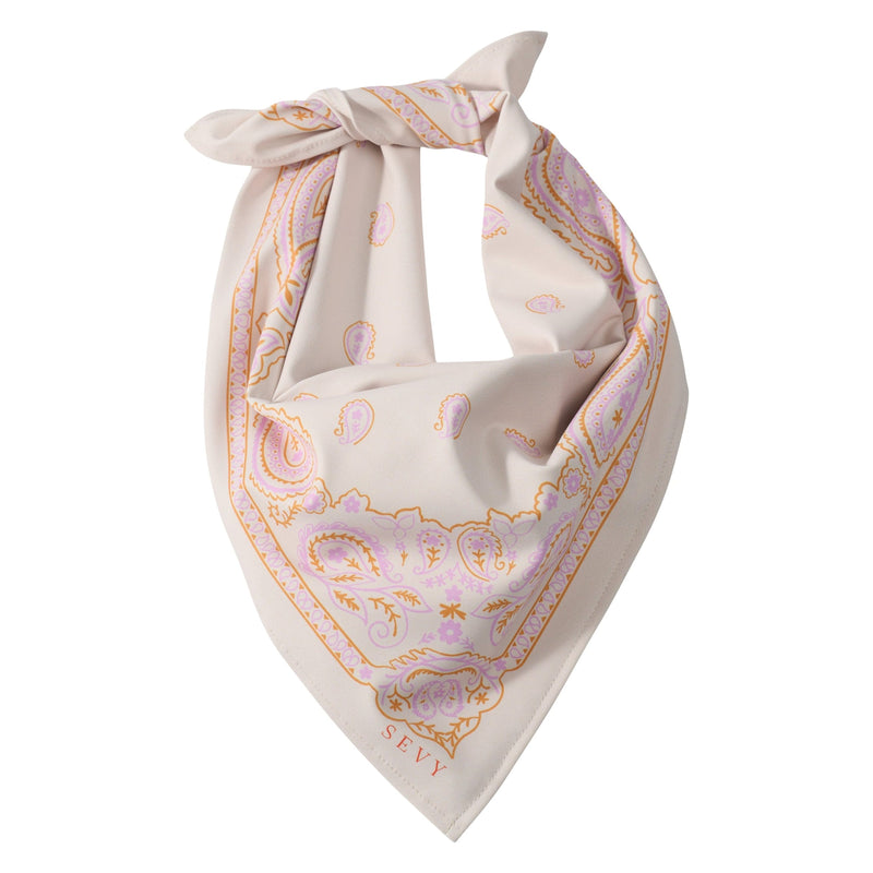 Sevy Sea Ranch Bandana in Sunset, oatmeal with orange and purple details, folded